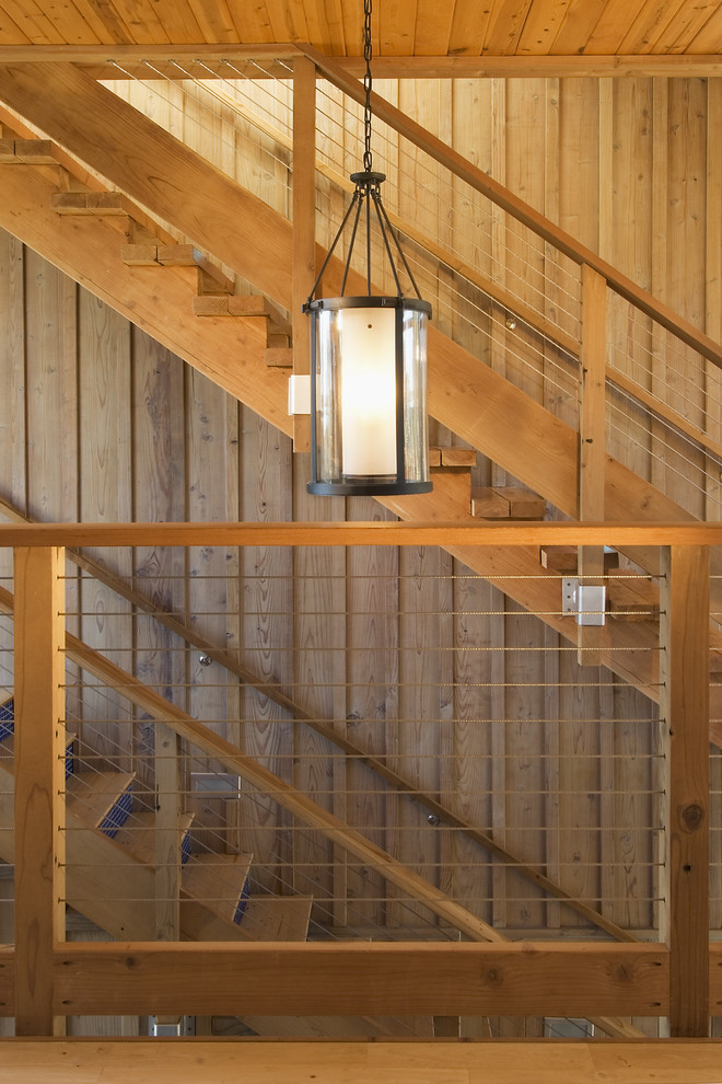 Источник вдохновения для домашнего уюта: лестница в современном стиле с перилами из тросов