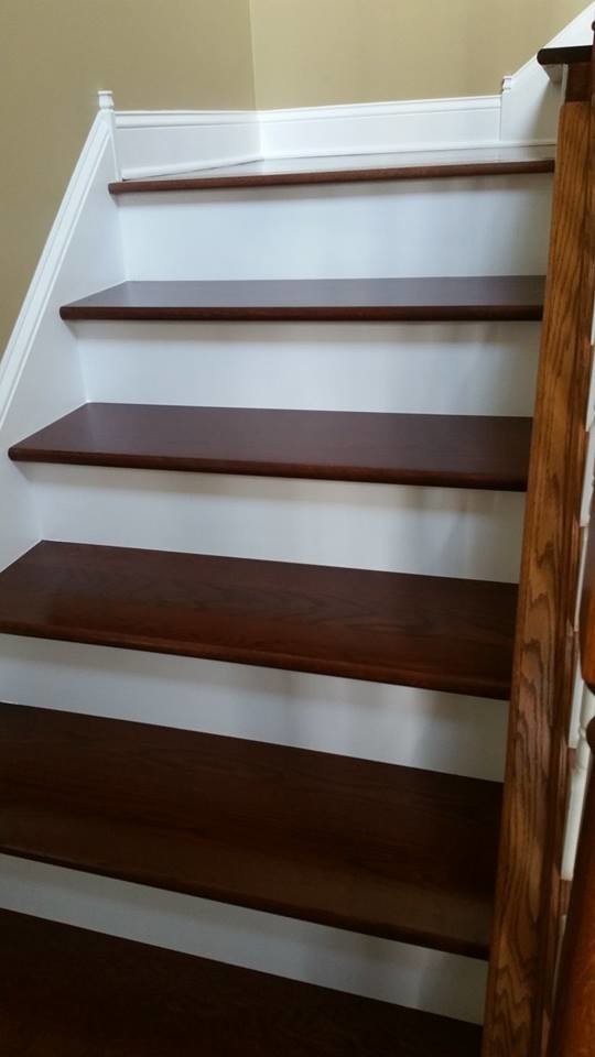 Example of a mid-sized classic wooden u-shaped wood railing staircase design in Philadelphia with painted risers