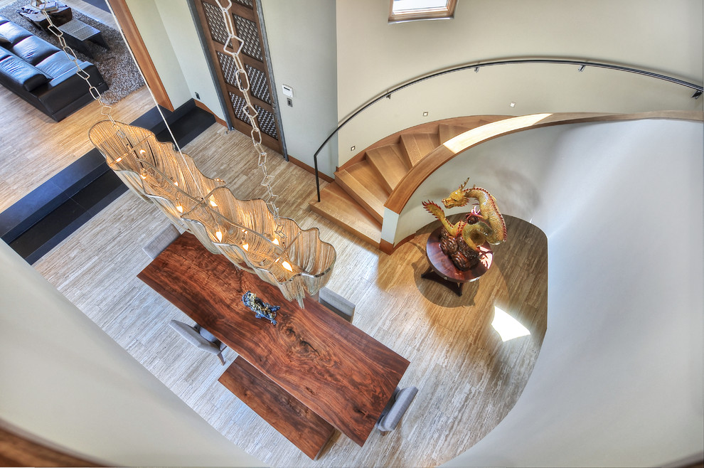 Contemporary wood curved staircase in Orange County with wood risers.