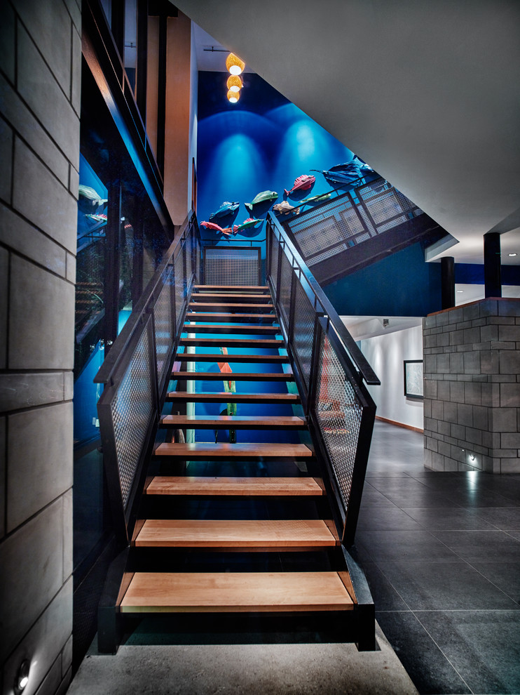 Inspiration for a contemporary wood l-shaped staircase in Dallas with open risers.