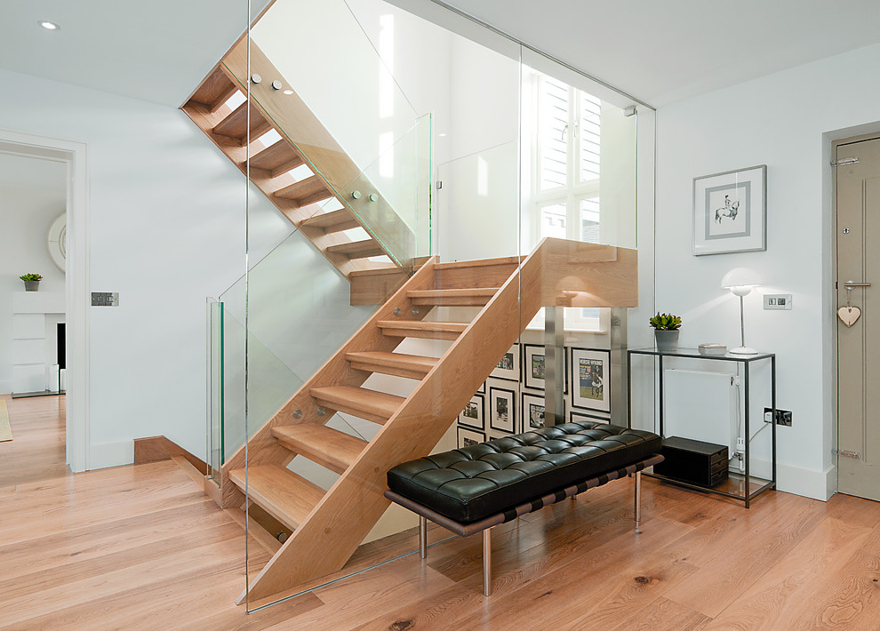 Photo of a contemporary staircase in London with feature lighting.
