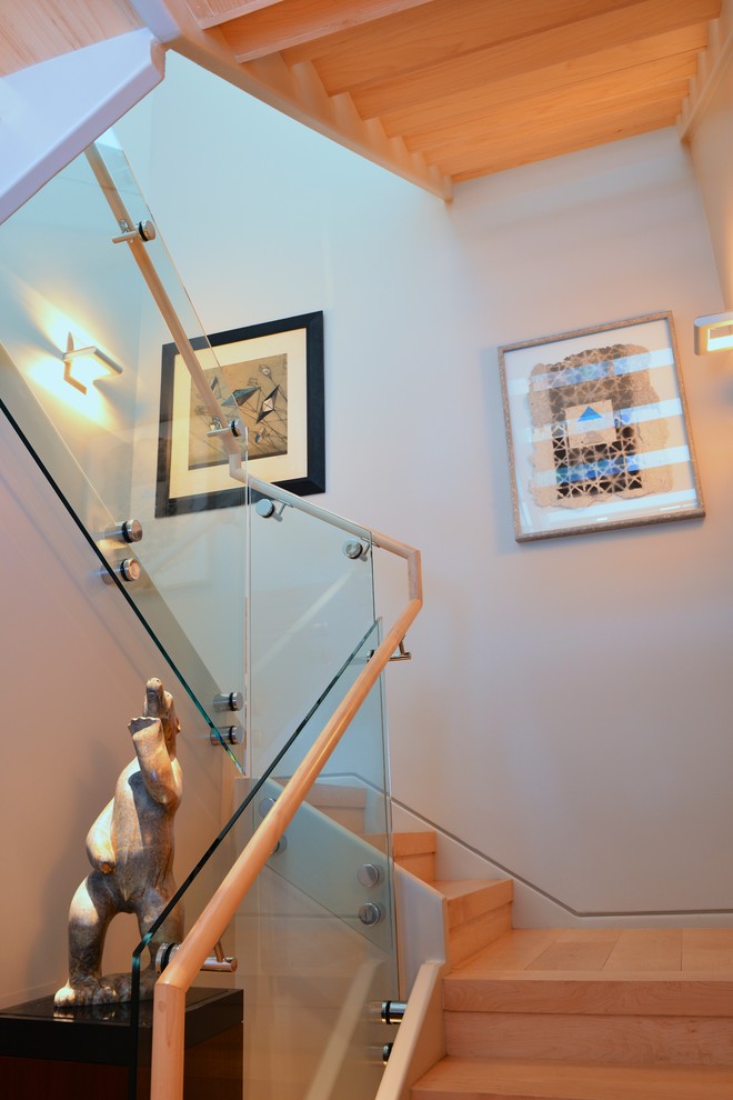 Inspiration for a mid-sized contemporary wooden u-shaped glass railing staircase remodel in Dallas with wooden risers