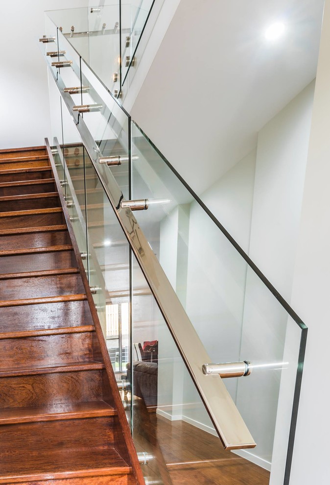 Photo of a contemporary wood straight staircase in Brisbane with wood risers.