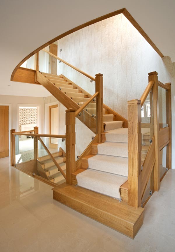 Example of a minimalist wooden l-shaped staircase design in Other with wooden risers