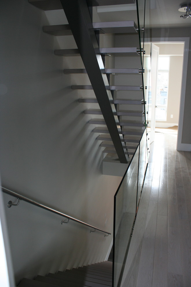Inspiration for a medium sized modern staircase in Ottawa.
