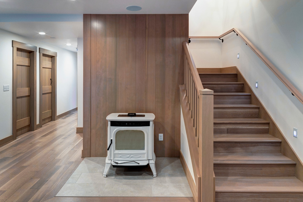 Staircase - mid-sized contemporary wooden l-shaped wood railing staircase idea in Portland with wooden risers