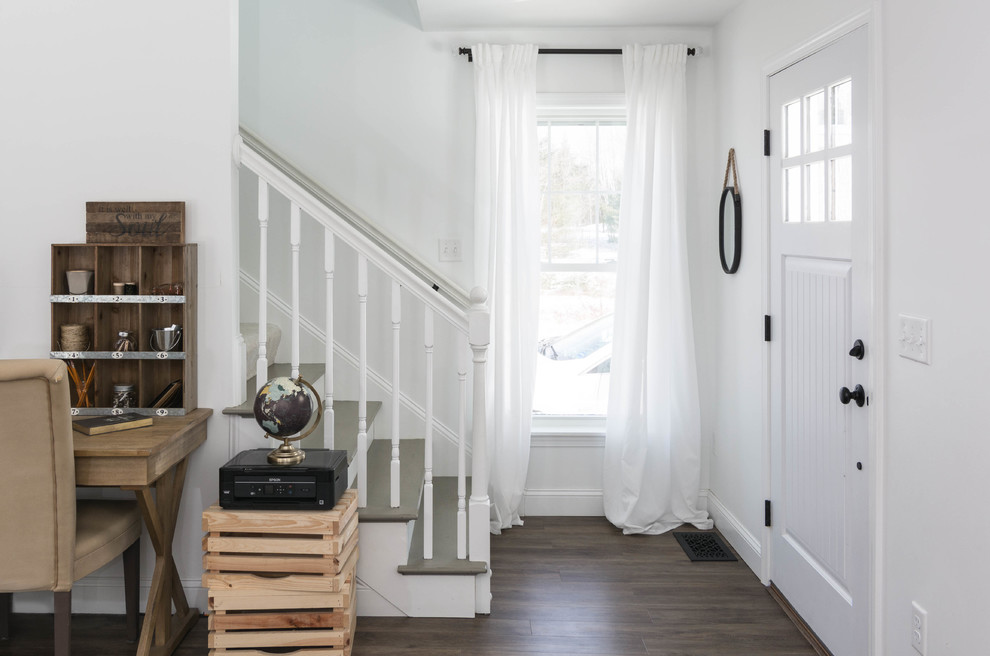 Example of a mid-sized cottage wooden straight wood railing staircase design in Portland Maine with wooden risers