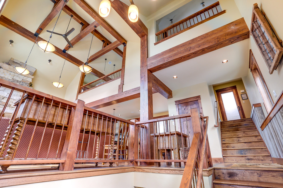 Example of a large mountain style staircase design in Denver