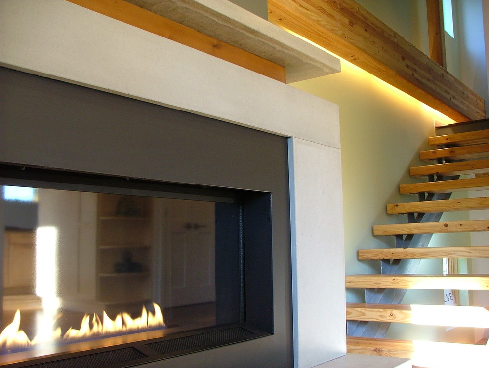 Example of a mid-sized trendy wooden straight open staircase design in Seattle