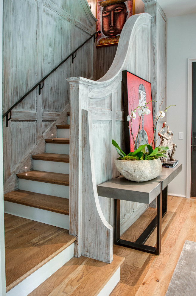 Design ideas for an eclectic wood wood railing staircase in Nashville with painted wood risers.