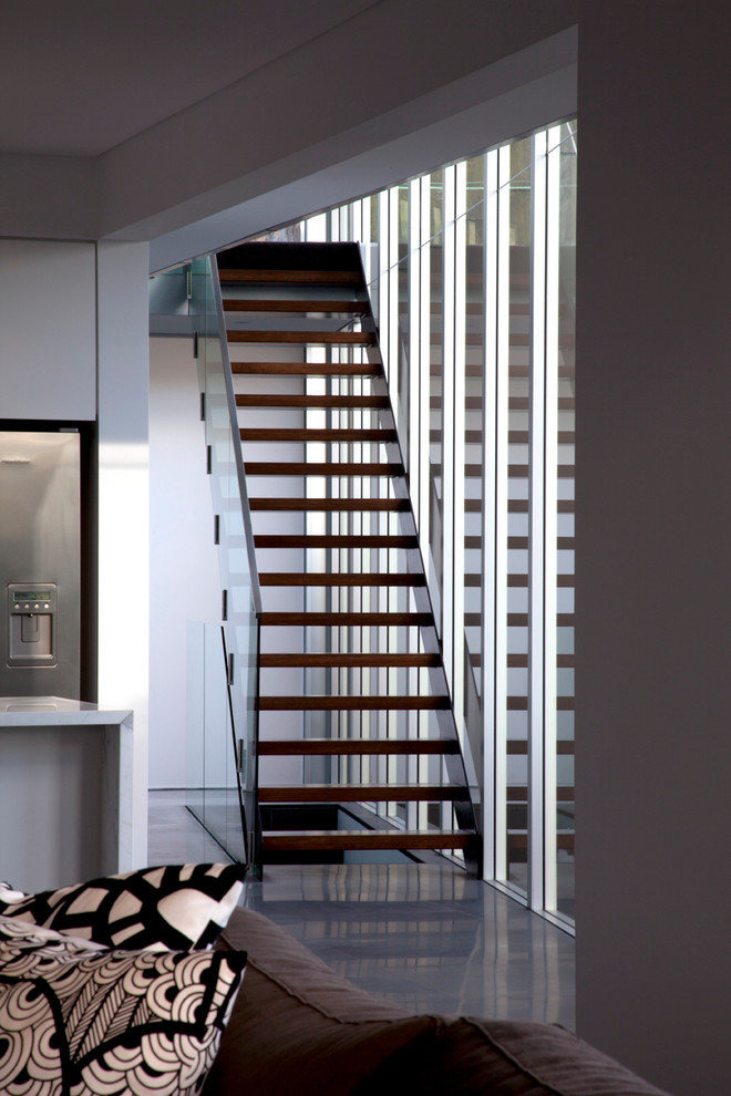 This is an example of a staircase in Sydney with feature lighting.