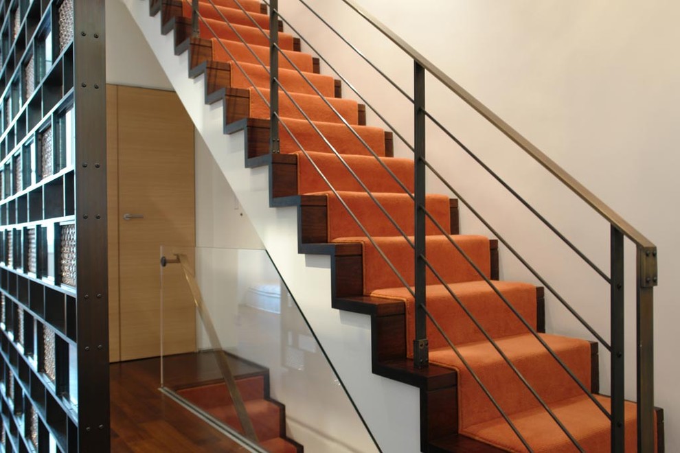 Inspiration for a contemporary wood staircase in New York.