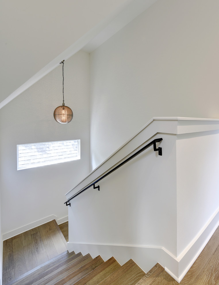 Small minimalist wooden l-shaped staircase photo in Austin