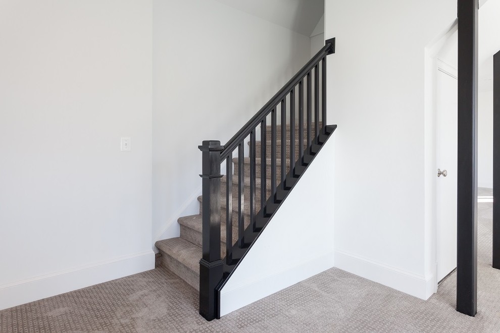 Inspiration for a cottage carpeted l-shaped wood railing staircase remodel in DC Metro with carpeted risers