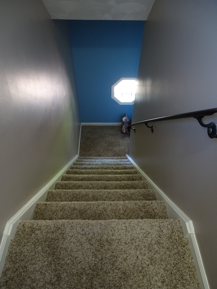 Exemple d'un escalier chic de taille moyenne.