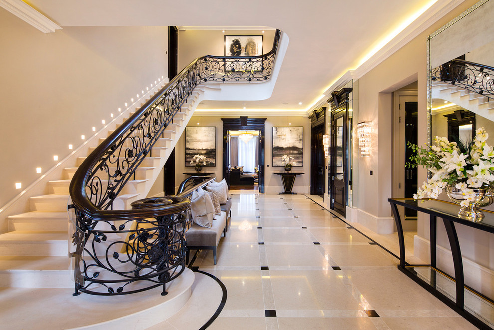 Inspiration for a classic curved staircase in London.