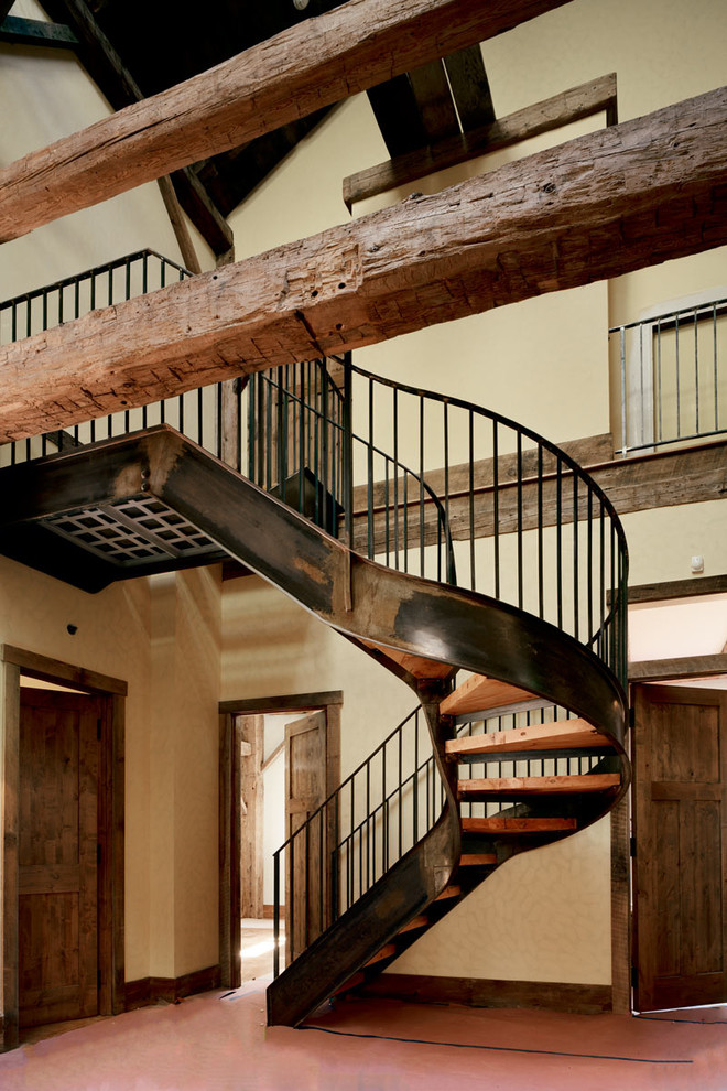 Mid-sized farmhouse wooden spiral open staircase photo in Bridgeport