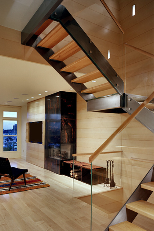 Example of a trendy wooden floating open staircase design in Baltimore