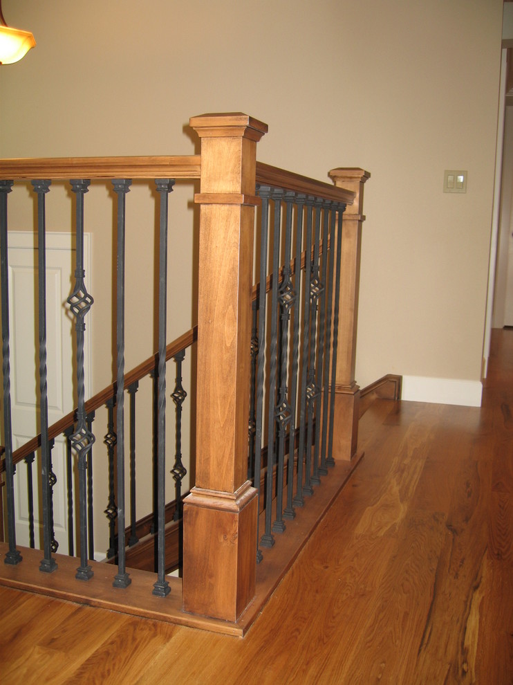 Example of a small carpeted u-shaped staircase design in Boise with carpeted risers