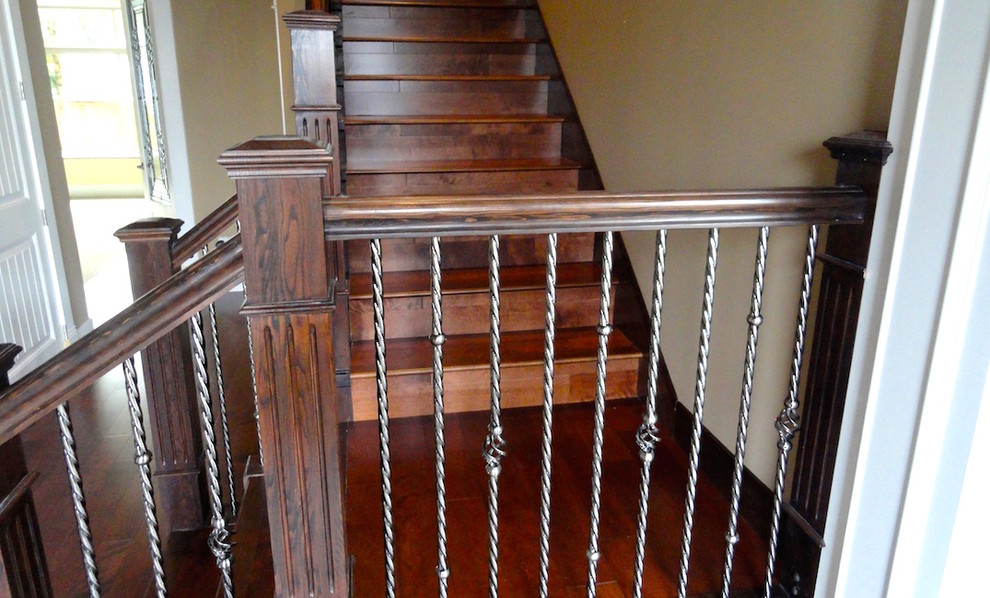 Staircase - mid-sized southwestern wooden l-shaped wood railing staircase idea in Vancouver with wooden risers