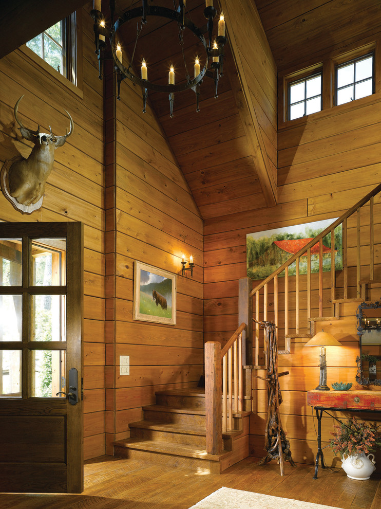 Diseño de escalera en L rural con escalones de madera y contrahuellas de madera