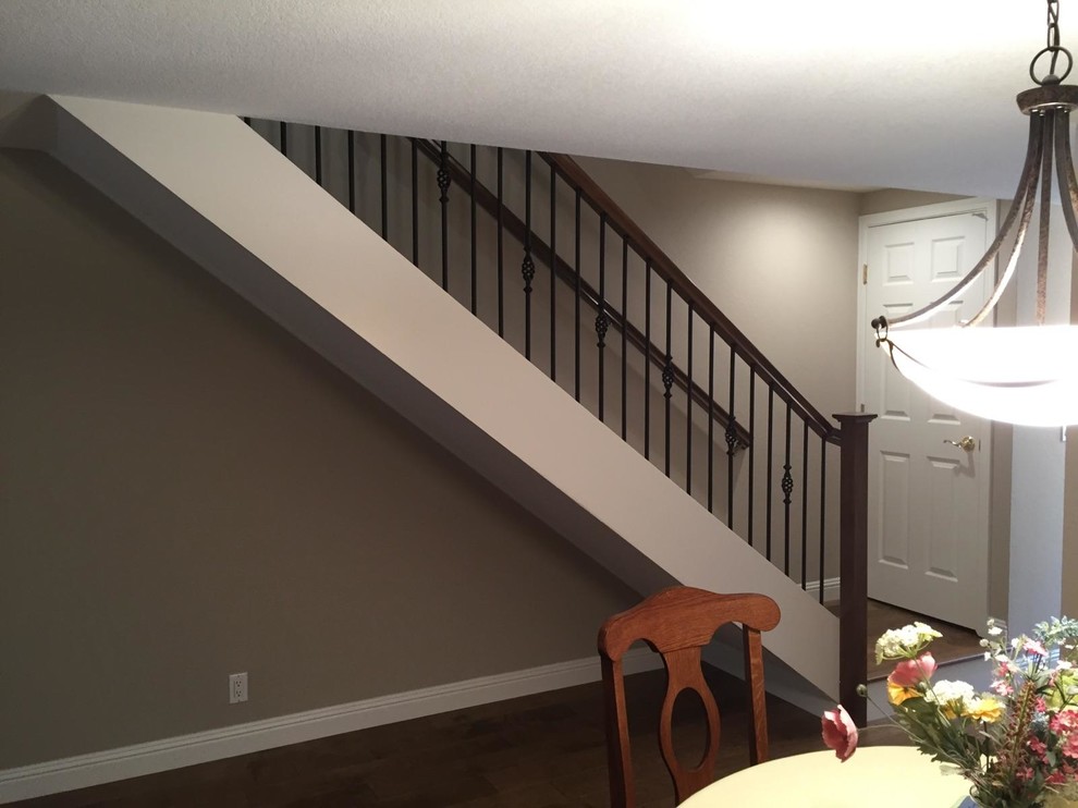 Example of a small classic wooden straight staircase design in San Francisco with wooden risers