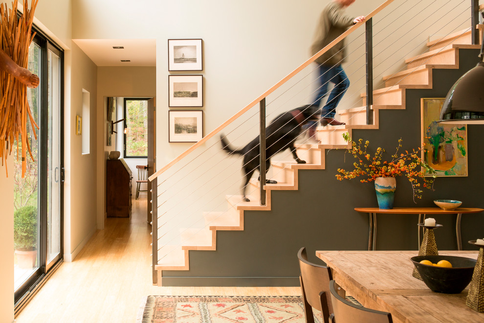 Small mountain style wooden straight mixed material railing staircase photo in Portland Maine with wooden risers