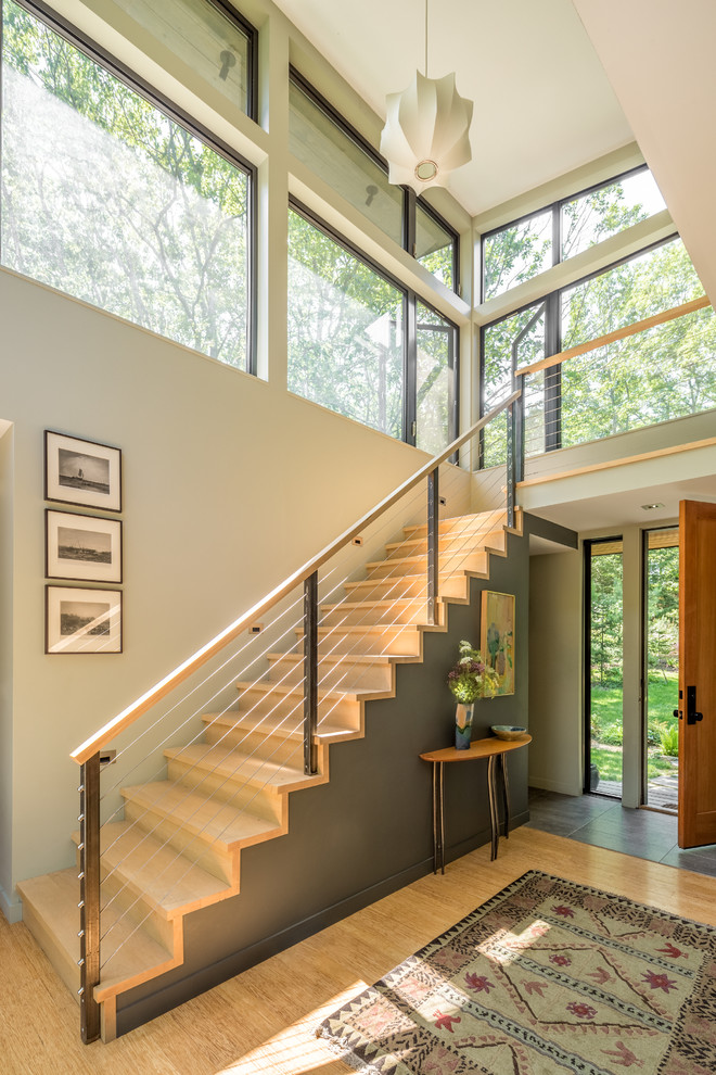 Staircase - rustic wooden straight mixed material railing staircase idea in Portland Maine with wooden risers