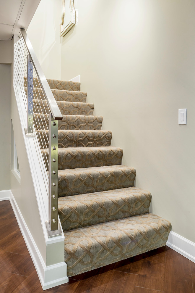 Mid-sized trendy carpeted straight staircase photo in Chicago with carpeted risers