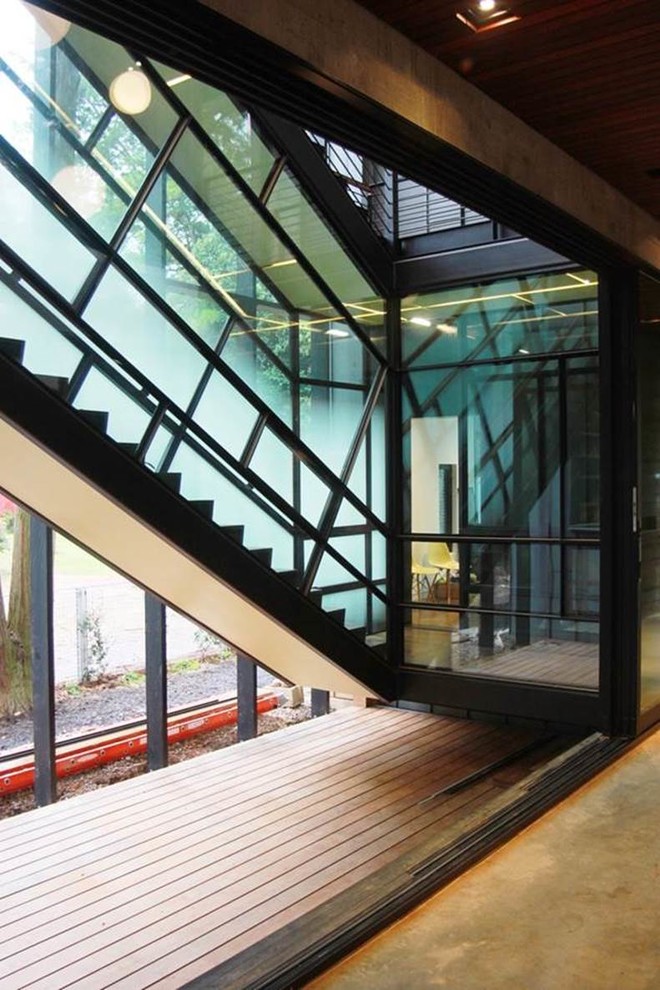 Ejemplo de escalera recta minimalista con escalones de madera