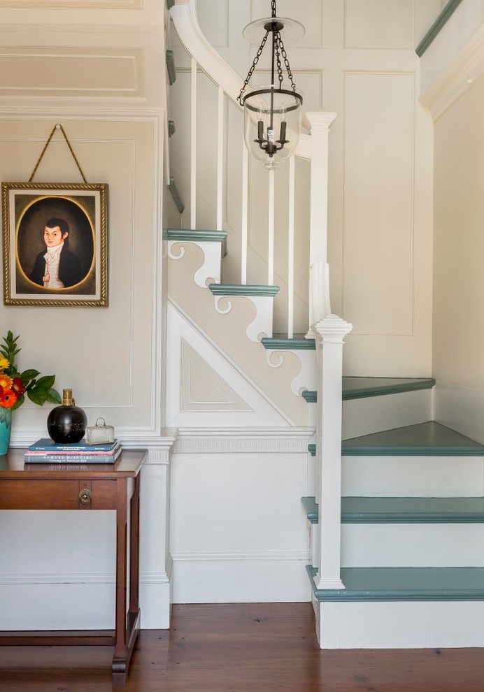 Example of a classic painted l-shaped staircase design in Boston with painted risers