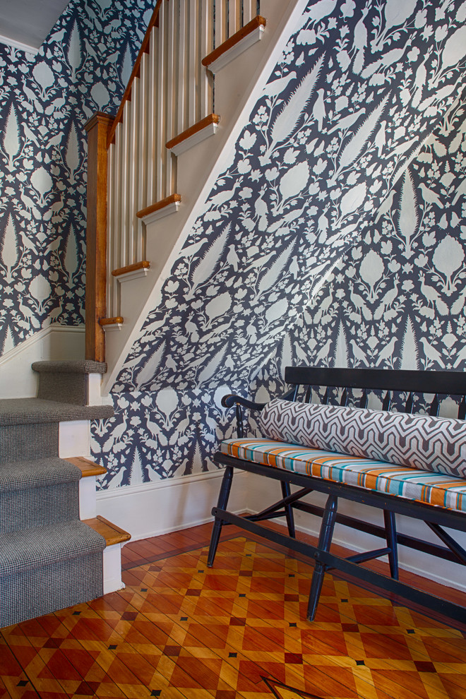 Example of a mid-sized farmhouse carpeted u-shaped wood railing staircase design in New York with carpeted risers