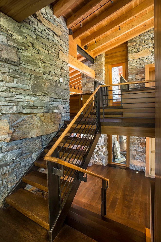 Imagen de escalera en L moderna grande sin contrahuella con escalones de madera