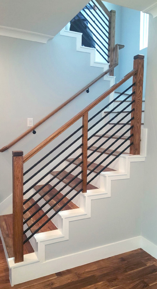 Example of a mid-sized minimalist staircase design in Houston