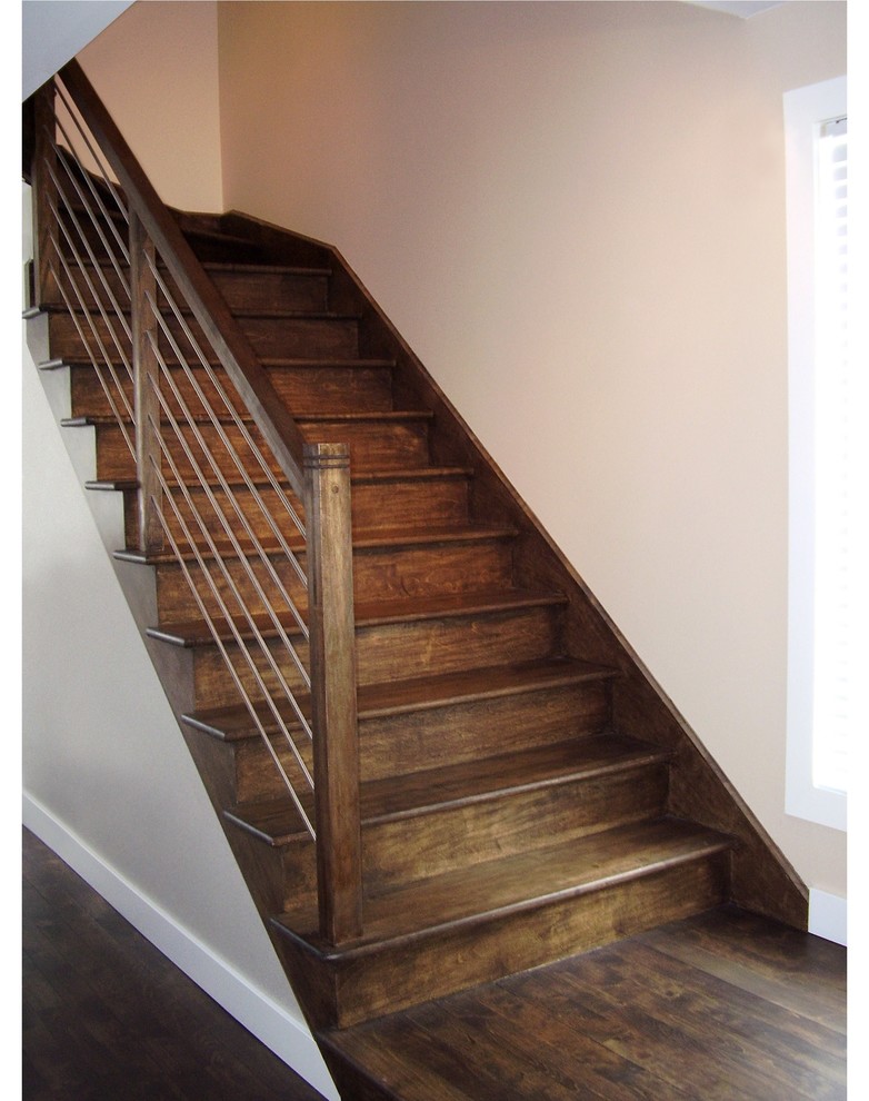 Mid-sized trendy wooden l-shaped staircase photo in Montreal with wooden risers
