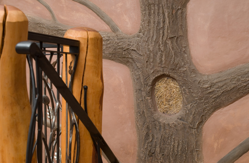 Foto de escalera en L rústica con escalones de madera y contrahuellas de madera