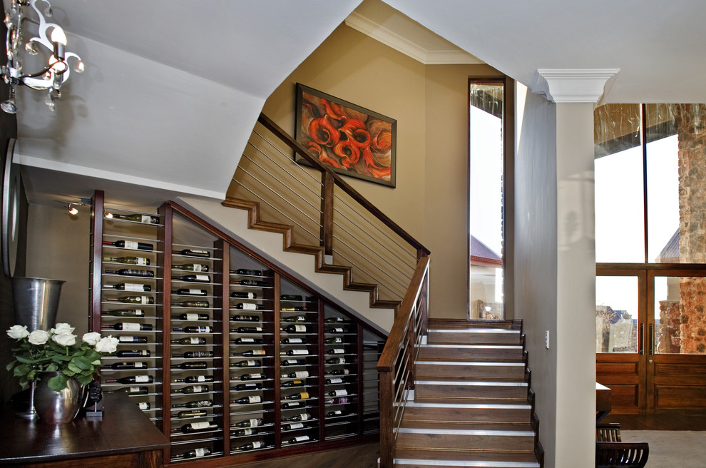 Elegant wooden staircase photo in Other with wooden risers