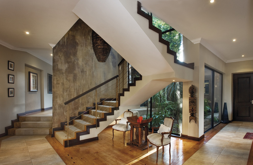 Inspiration for a timeless wooden staircase remodel in Other with wooden risers