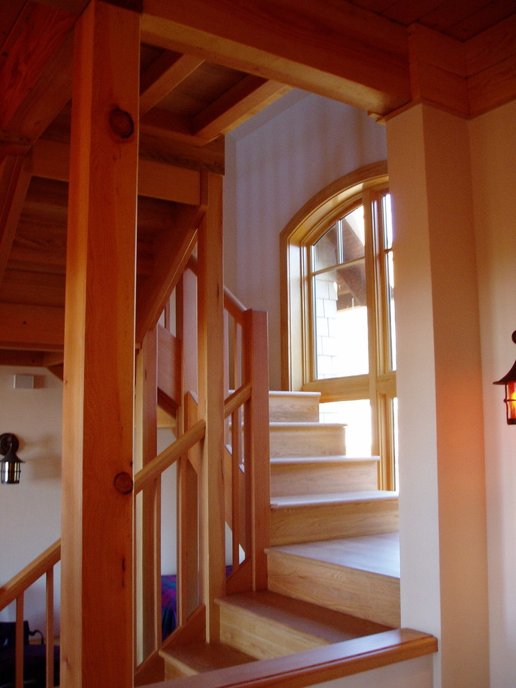 Coastal wood staircase in Portland with wood risers.