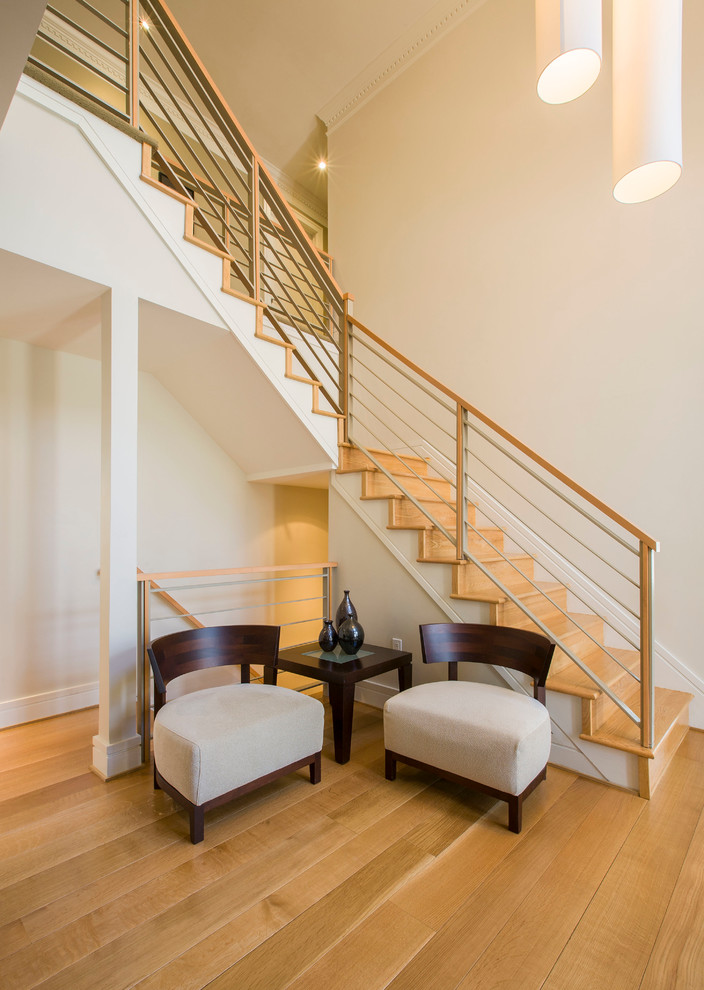 Exemple d'un escalier tendance en L avec des marches en bois et des contremarches en bois.