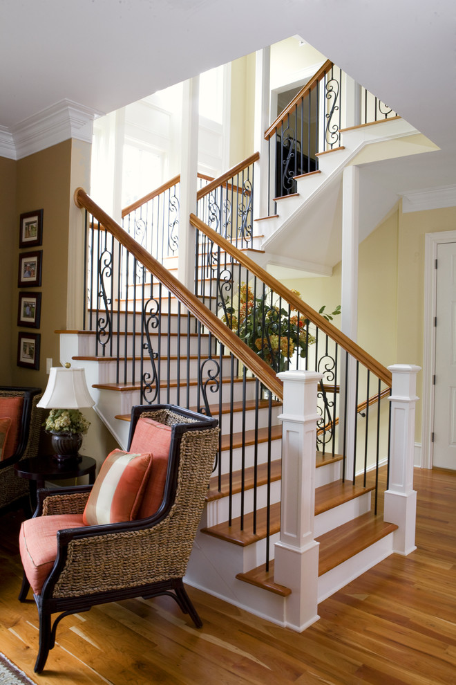 Inspiration for a classic staircase in Charleston with feature lighting.