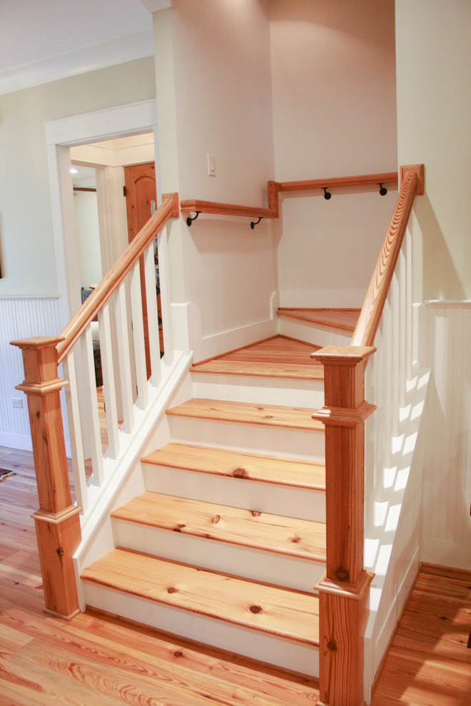 Mid-sized arts and crafts wooden l-shaped staircase photo in Miami with painted risers