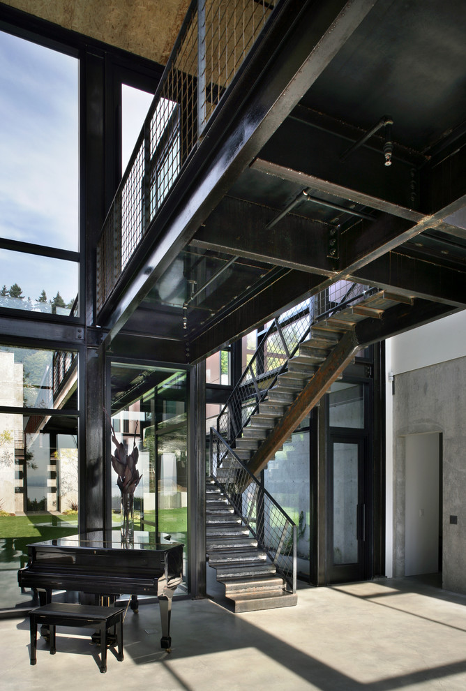 Inspiration for a mid-sized industrial metal u-shaped staircase remodel in Seattle with metal risers