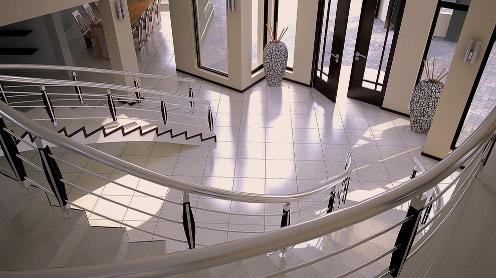 Cette image montre un grand escalier carrelé hélicoïdal design avec des contremarches en métal.