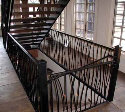 Staircase - contemporary staircase idea in Other