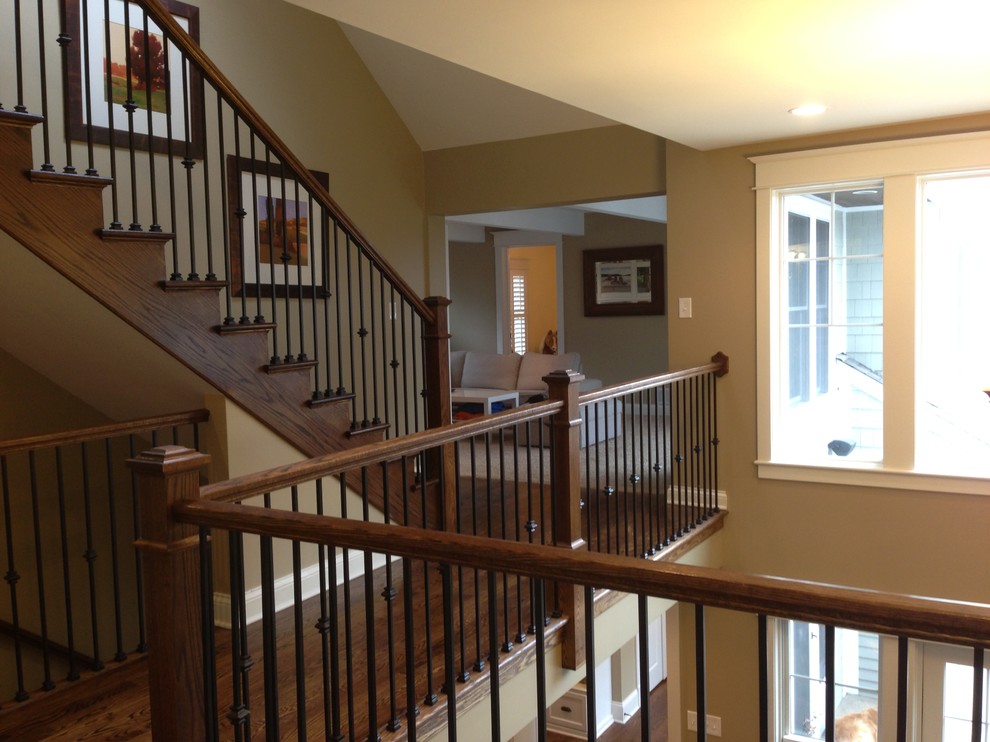 Example of a mid-sized classic wooden straight wood railing staircase design in Chicago with wooden risers