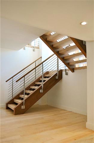 Staircase - mid-sized modern wooden floating open and metal railing staircase idea in Other