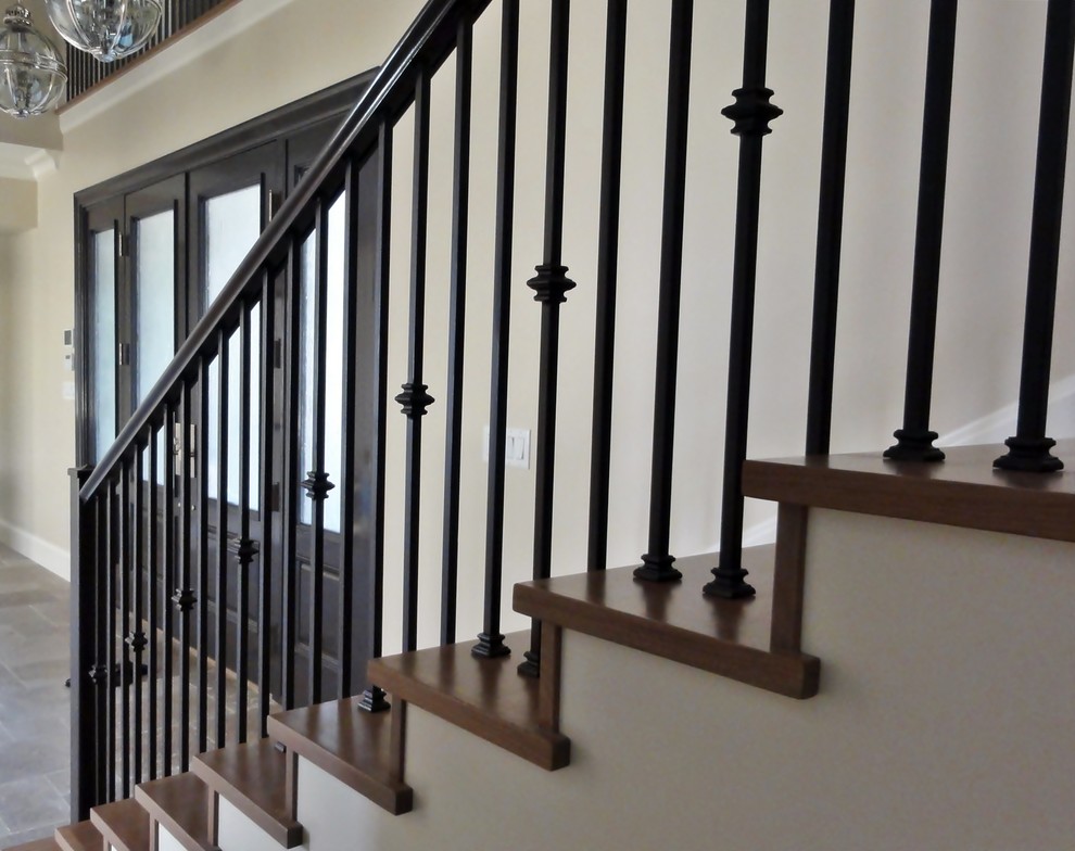 Example of a mid-sized trendy wooden straight staircase design in Vancouver with wooden risers