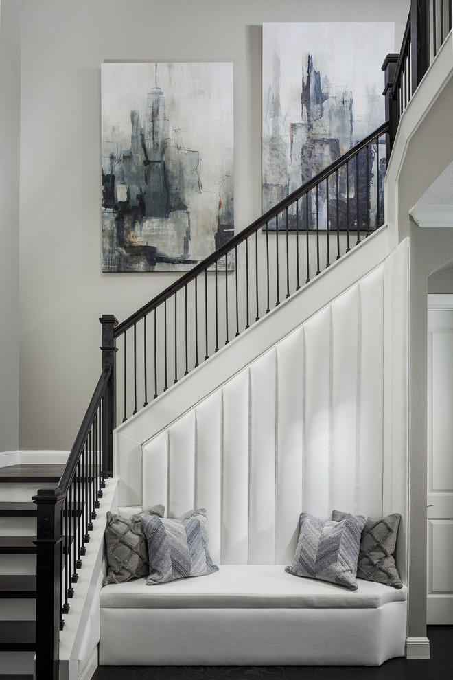 Inspiration for a transitional wooden l-shaped mixed material railing staircase remodel in Orlando with painted risers