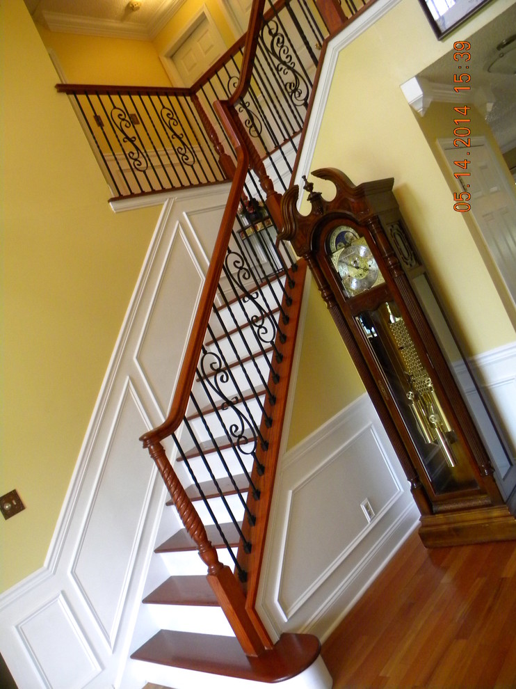 Mid-sized elegant wooden l-shaped staircase photo in Philadelphia with wooden risers